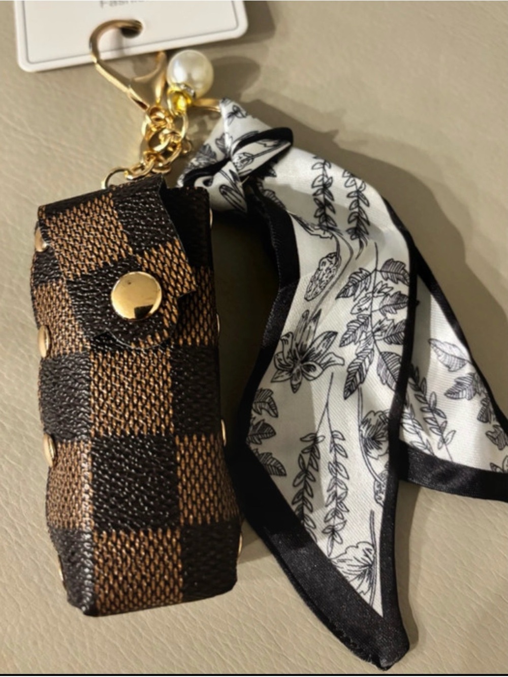 Brown Checkered Leather Keychain with Floral Scarf Accent